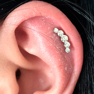 Scapha piercing with five stones jewel