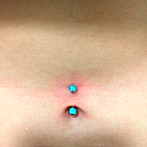 Navel piercing with Industrial Strength jewel