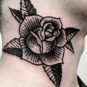 Medieval engraving of rose on the neck
